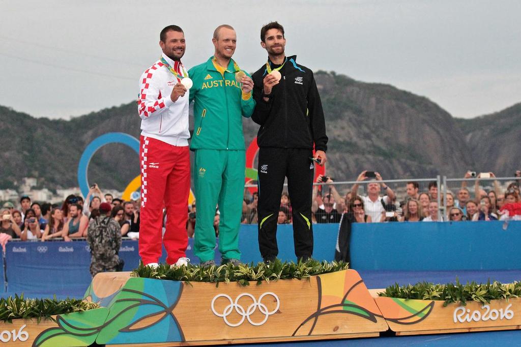 Tonci Stipanovic (CRO), Tom Burton (AUS) and Sam Meech (NZL) with their Silver, Gold and Bronze medals - Mens Laser - 2016 Sailing Olympics  &copy; Richard Gladwell www.photosport.co.nz